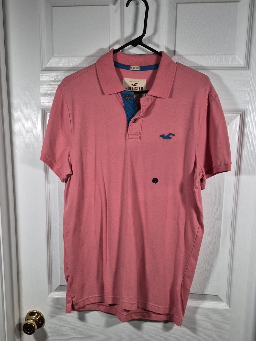 Hollister Men's Dusty Pink Polo with Blue Trim